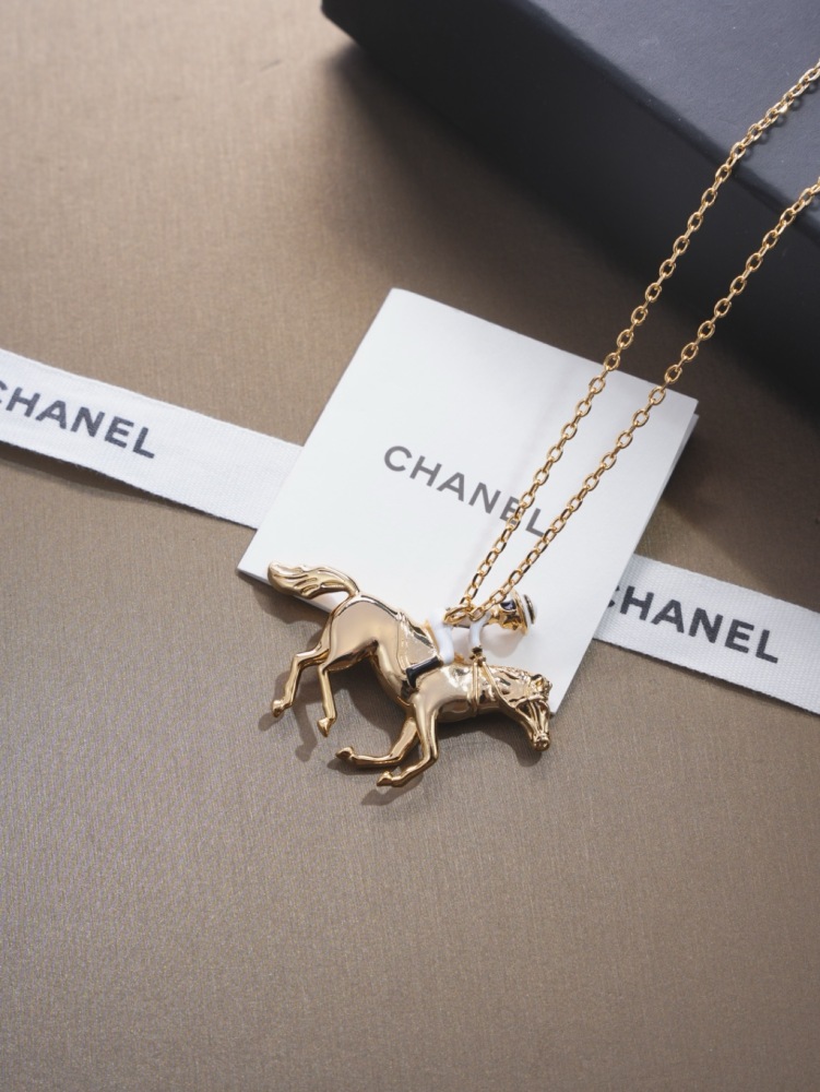 CHANEL HORSE RIDER GOLD PENDANT NECKLACE
