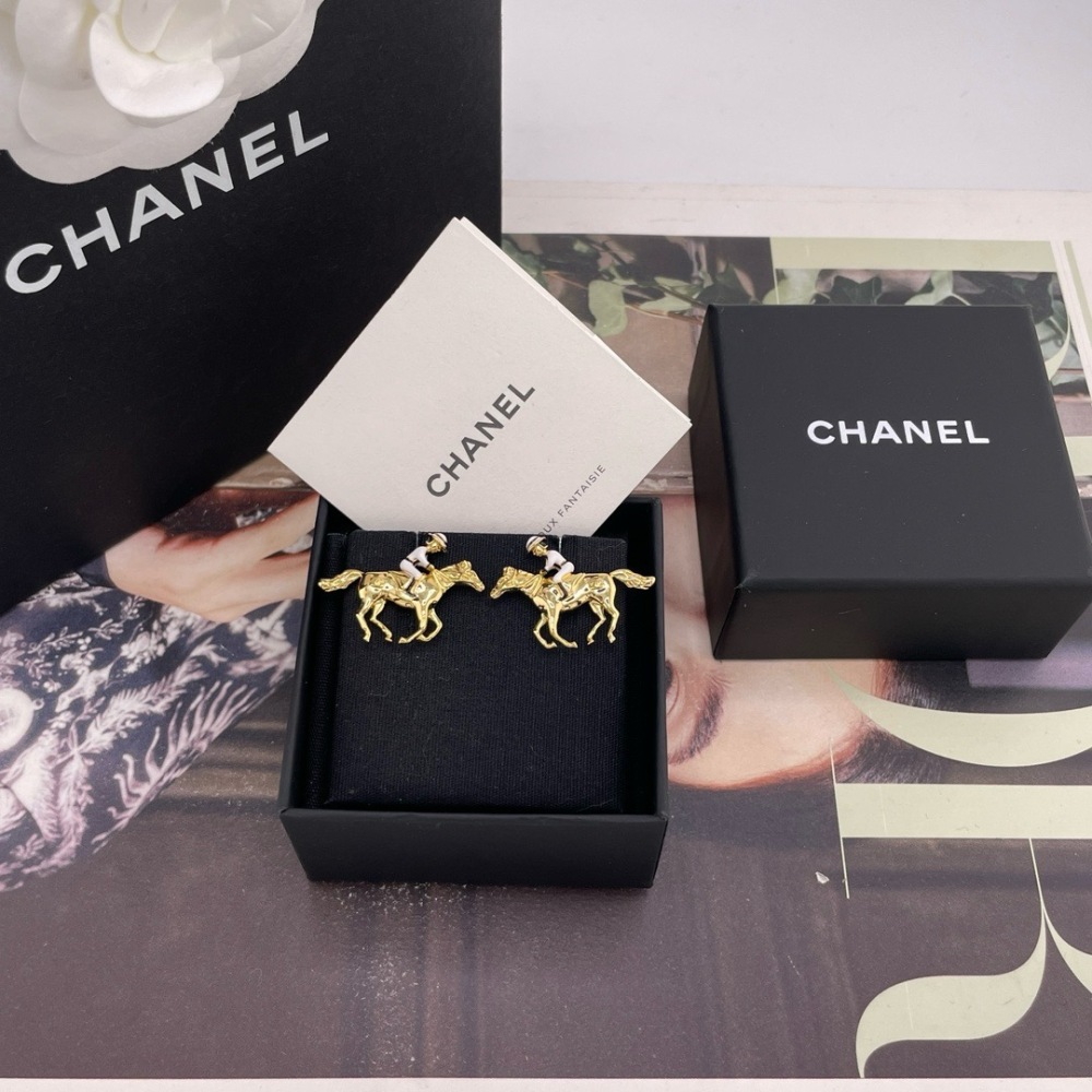 CHANEL HORSE RIDER GOLD STUD EARRINGS