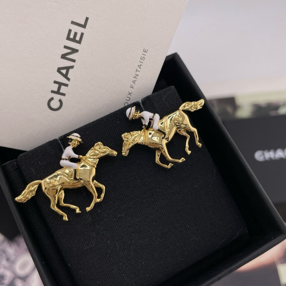 CHANEL HORSE RIDER GOLD STUD EARRINGS