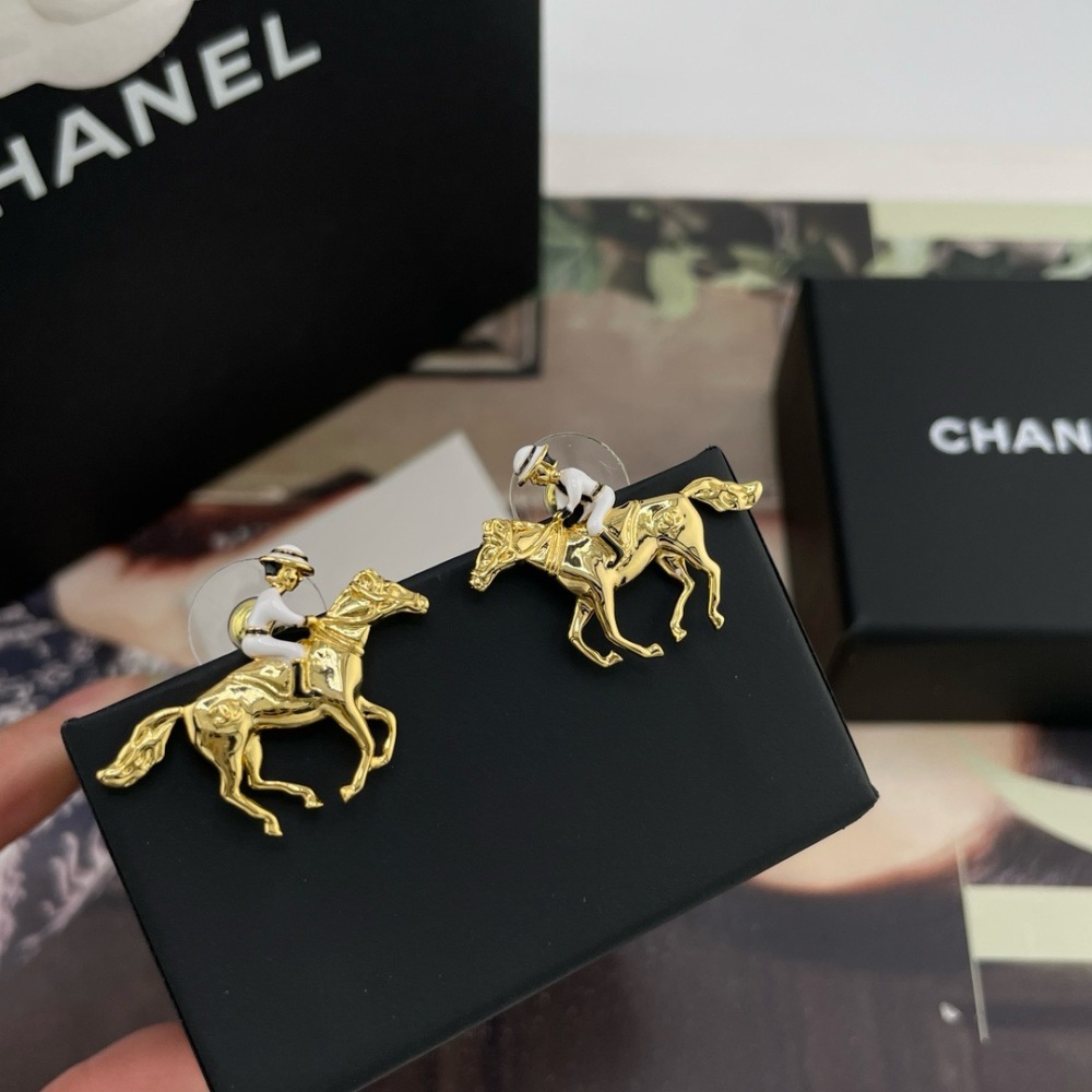 CHANEL HORSE RIDER GOLD STUD EARRINGS