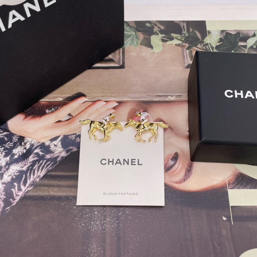 CHANEL HORSE RIDER GOLD STUD EARRINGS