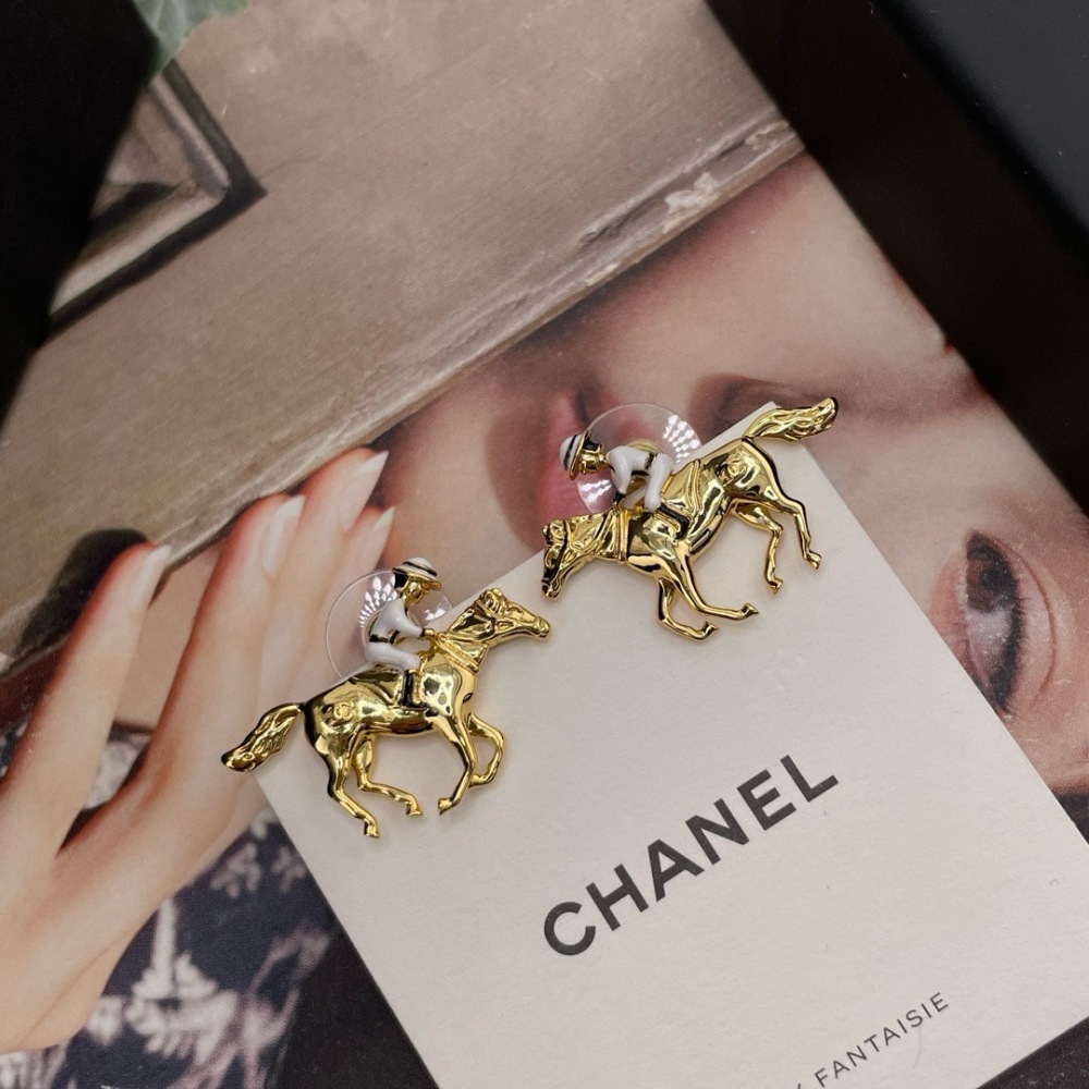 CHANEL HORSE RIDER GOLD STUD EARRINGS