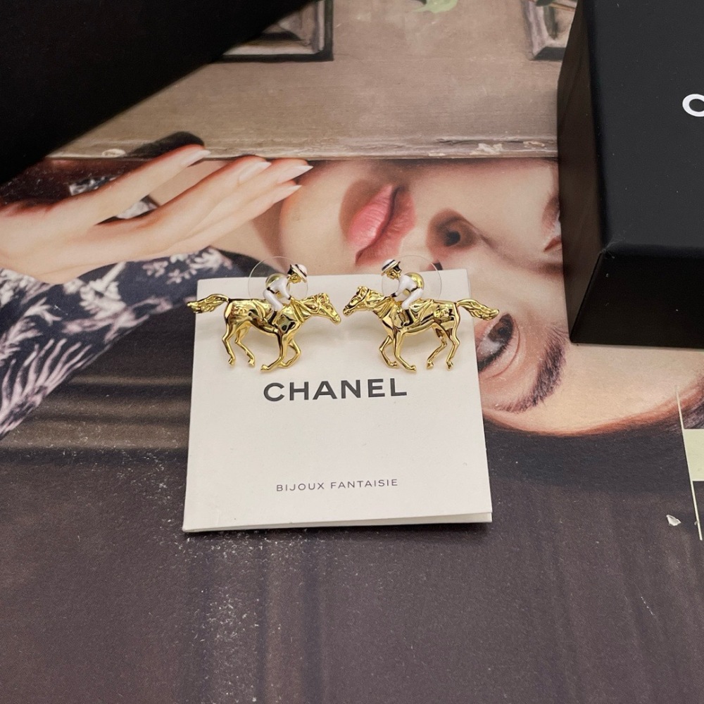 CHANEL HORSE RIDER GOLD STUD EARRINGS