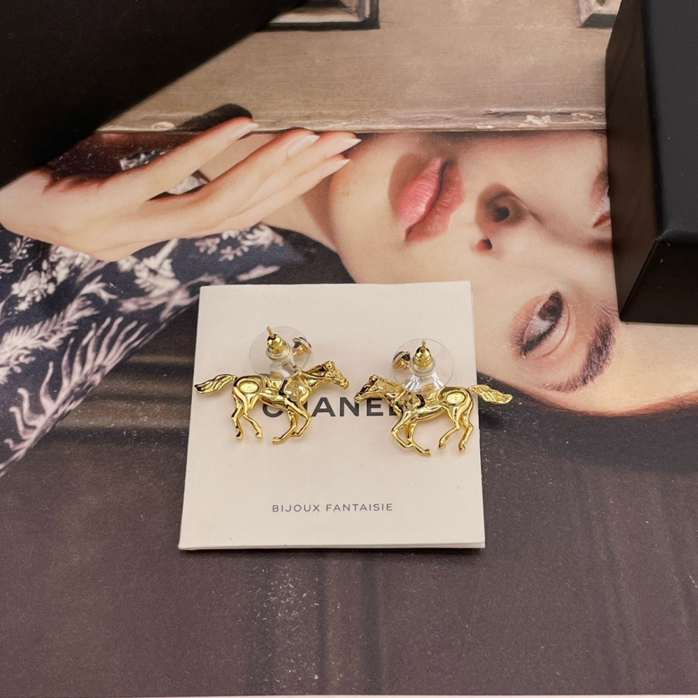 CHANEL HORSE RIDER GOLD STUD EARRINGS
