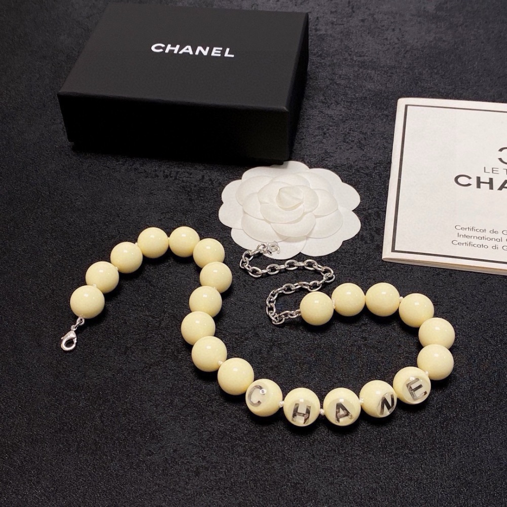 CHANEL CREAM BEAD SILVER LETTER ADJUSTABLE NECKLACE