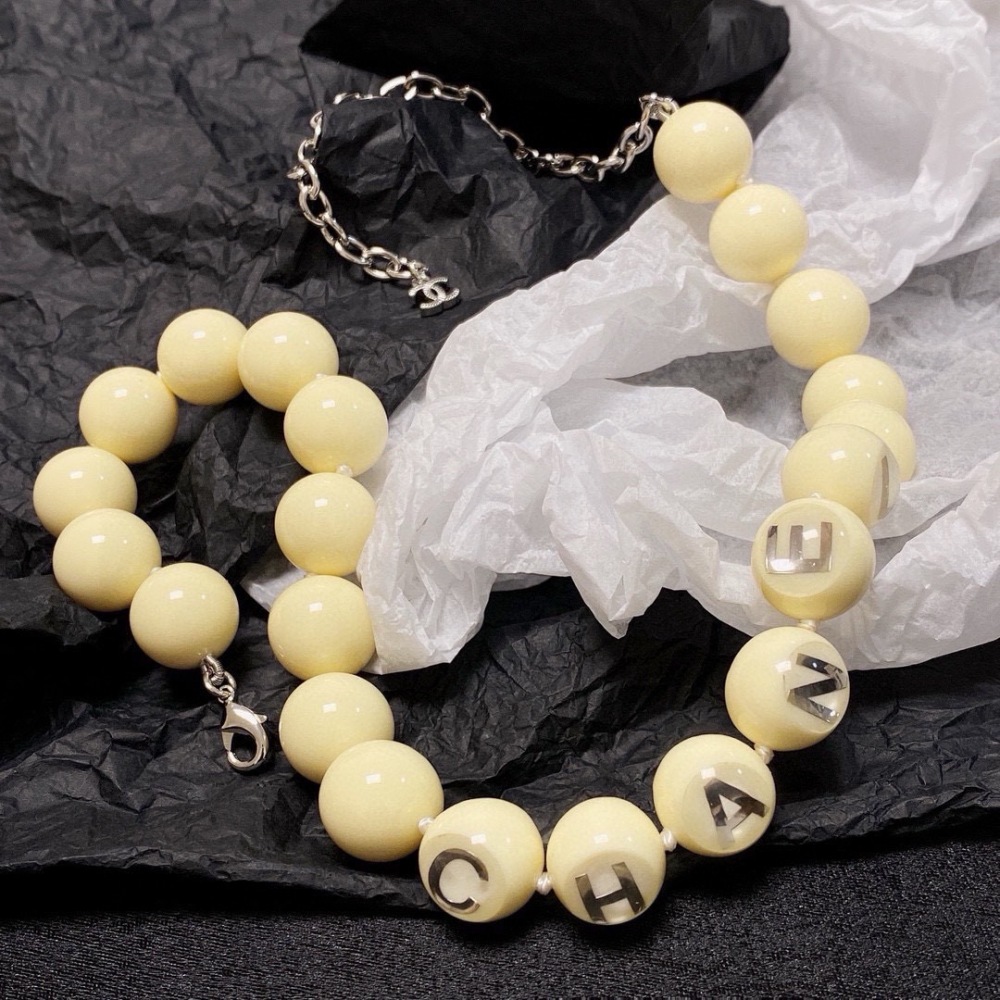 CHANEL CREAM BEAD SILVER LETTER ADJUSTABLE NECKLACE
