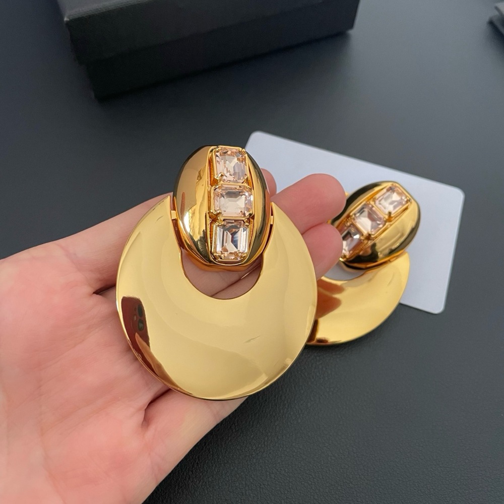 YSL POLISHED GOLD PINK CRYSTAL CRESCENT STATEMENT EARRINGS