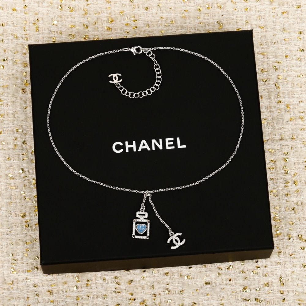 CHANEL PERFUME BOTTLE BLUE HEART INTERLOCKING CC NECKLACE