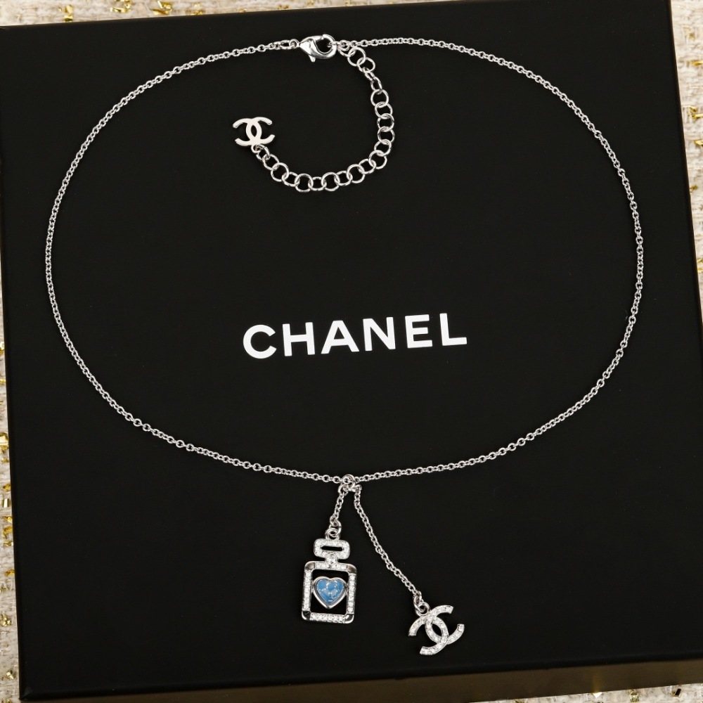 CHANEL PERFUME BOTTLE BLUE HEART INTERLOCKING CC NECKLACE
