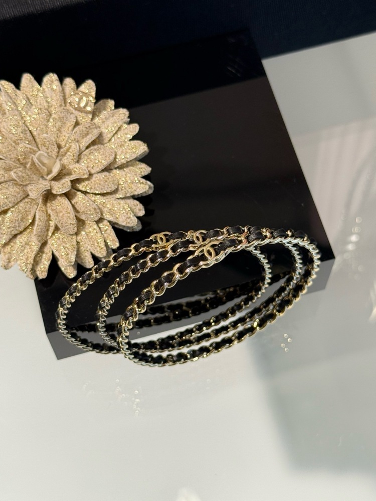 CHANEL TRIPLE ROW INTERWOVEN LEATHER CHAIN BANGLE