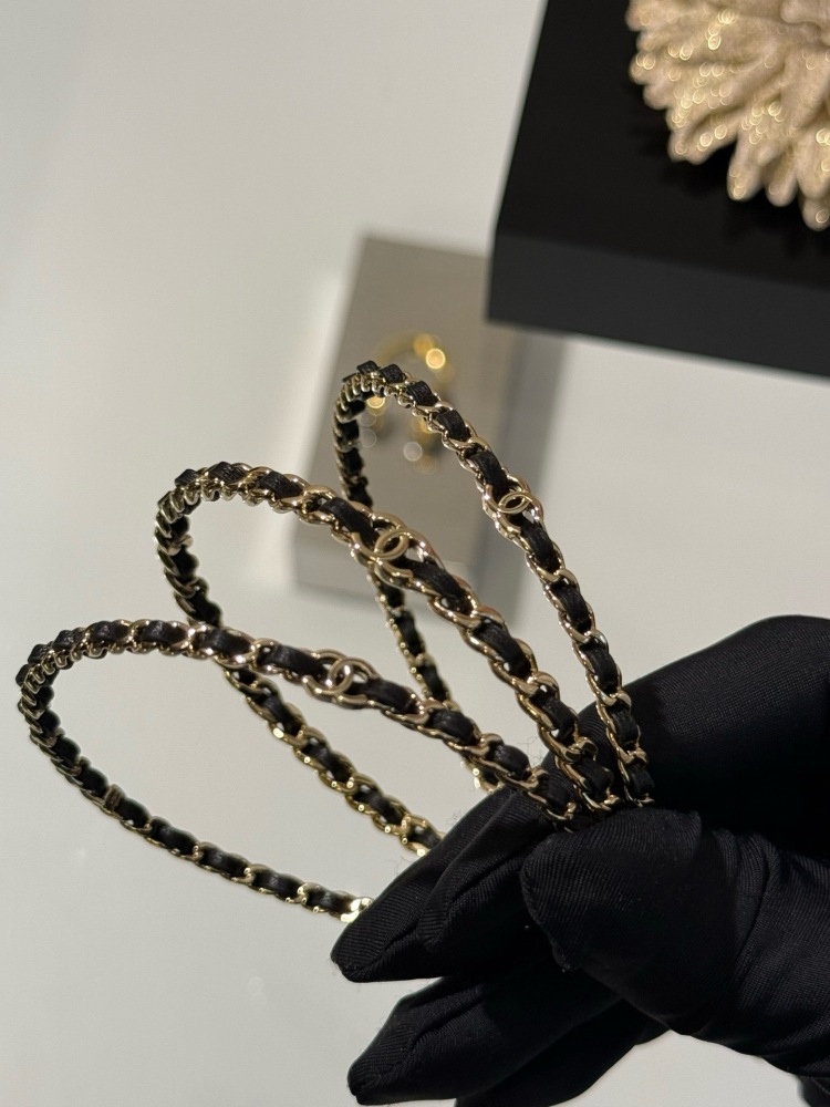 CHANEL TRIPLE ROW INTERWOVEN LEATHER CHAIN BANGLE