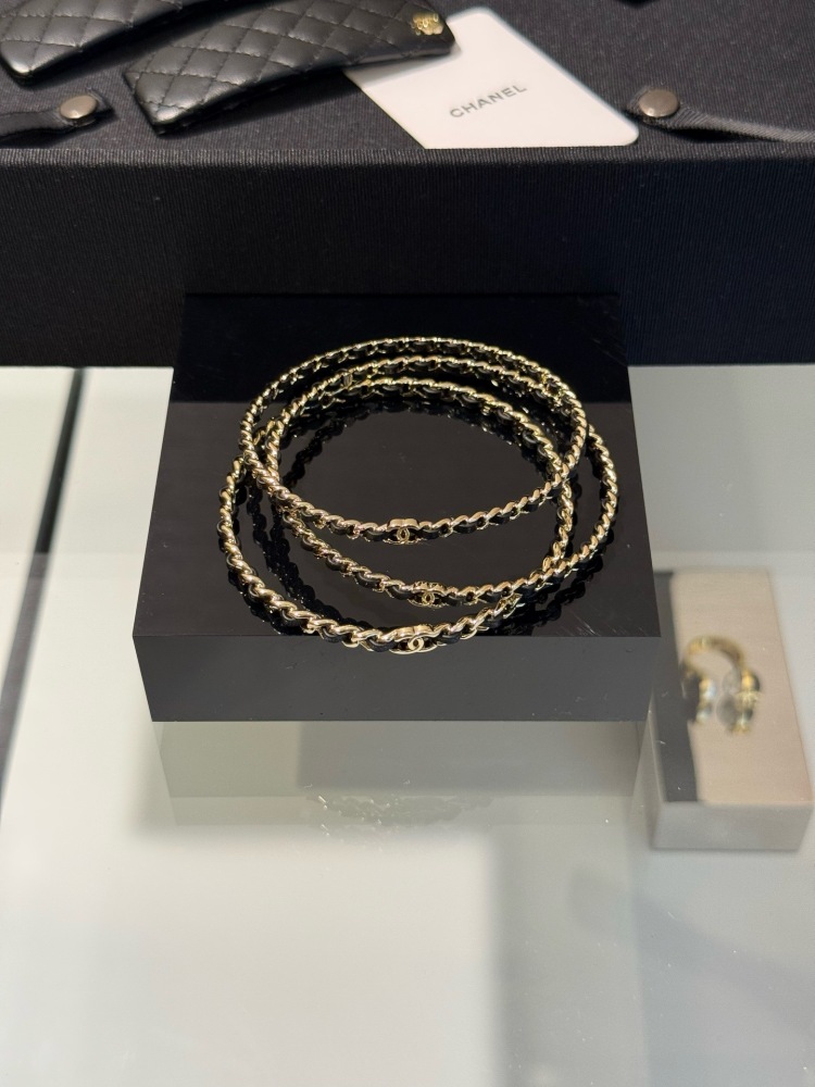 CHANEL TRIPLE ROW INTERWOVEN LEATHER CHAIN BANGLE