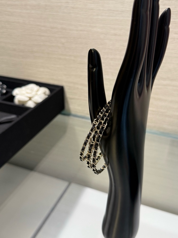 CHANEL TRIPLE ROW INTERWOVEN LEATHER CHAIN BANGLE