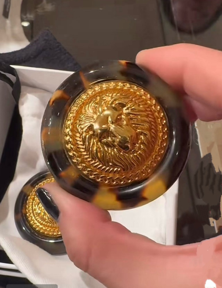 CHANEL TORTOISE SHELL GOLD LION HEAD CLIP ON EARRINGS