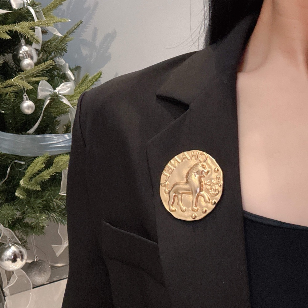 CHANEL GOLD ROUND COIN LION EMBOSSED BROOCH