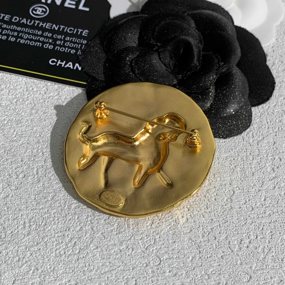 CHANEL GOLD ROUND COIN LION EMBOSSED BROOCH