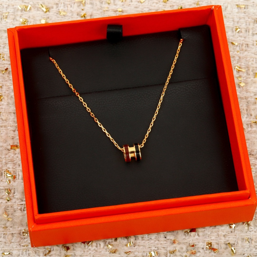 GOLD H PENDANT NECKLACE WITH RED & BLACK ENAMEL