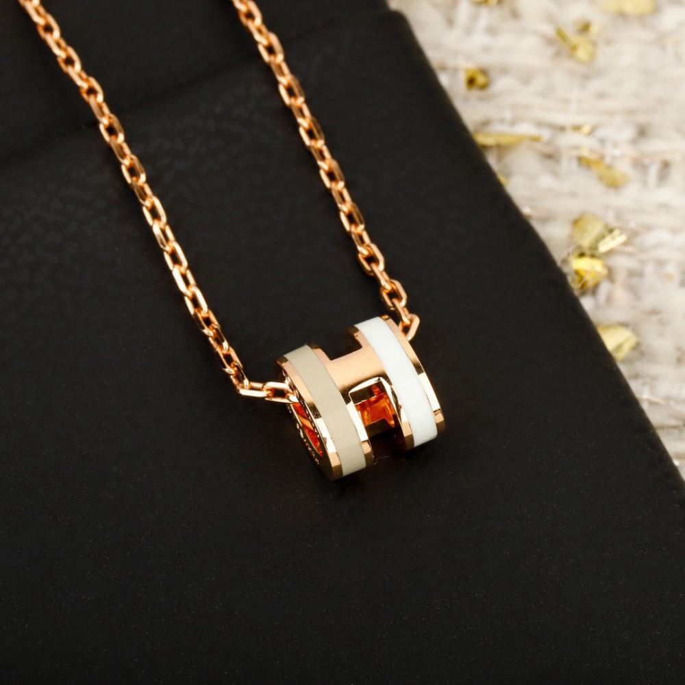GOLD H PENDANT NECKLACE WITH RED & BLACK ENAMEL