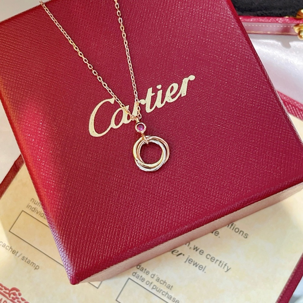 CARTIER TRINITY DE CARTIER NECKLACE, 18K TRICOLOR GOLD, PINK SAPPHIRE ACCENT