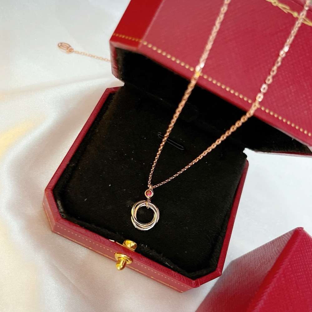 CARTIER TRINITY DE CARTIER NECKLACE, 18K TRICOLOR GOLD, PINK SAPPHIRE ACCENT