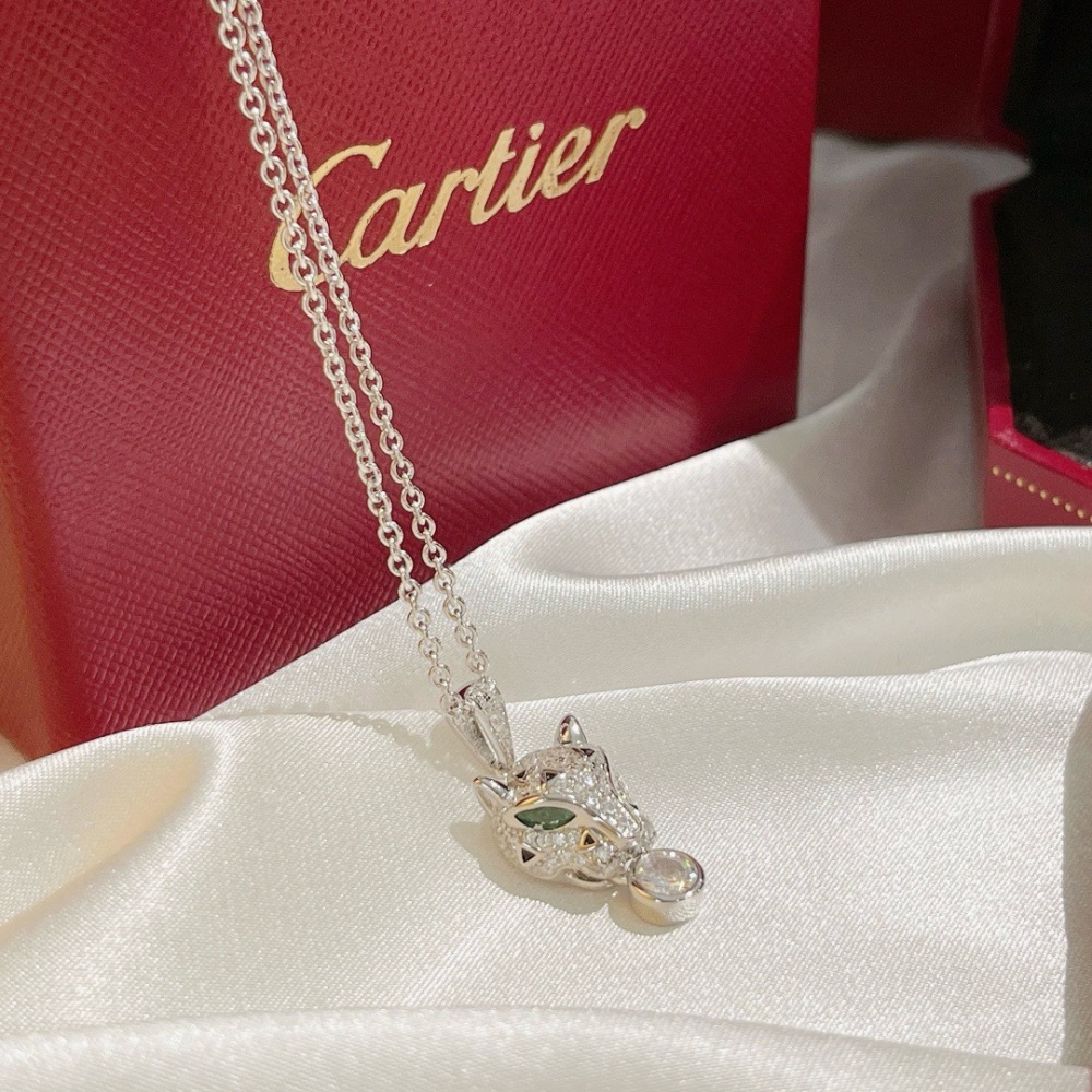 CARTIER PANTHÈRE DE CARTIER NECKLACE, 18K WHITE GOLD FULL PAVÉ DIAMONDS, EMERALD EYES & ROUND DIAMOND PENDANT