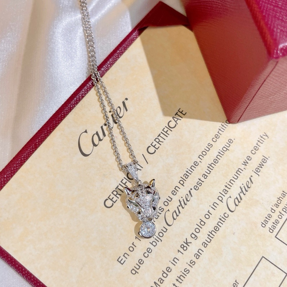 CARTIER PANTHÈRE DE CARTIER NECKLACE, 18K WHITE GOLD FULL PAVÉ DIAMONDS, EMERALD EYES & ROUND DIAMOND PENDANT