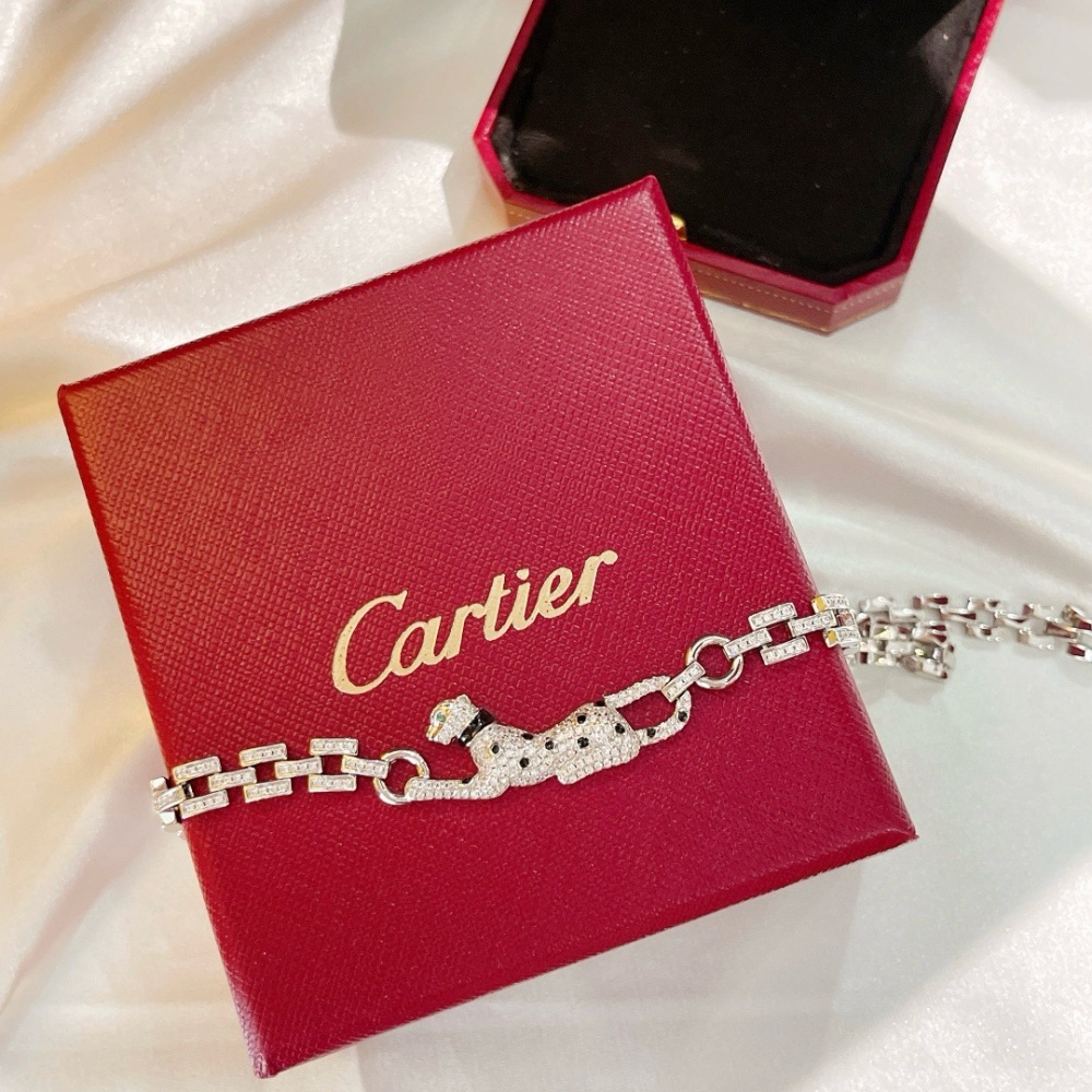 CARTIER PANTHÈRE DE CARTIER BRACELET, 18K WHITE GOLD FULL PAVÉ DIAMONDS, EMERALD EYES & ONYX SPOTS
