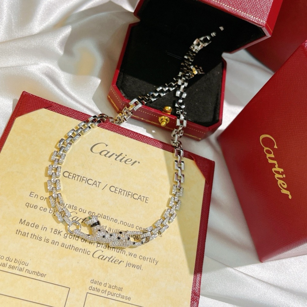 CARTIER PANTHÈRE DE CARTIER BRACELET, 18K WHITE GOLD FULL PAVÉ DIAMONDS, EMERALD EYES & ONYX SPOTS