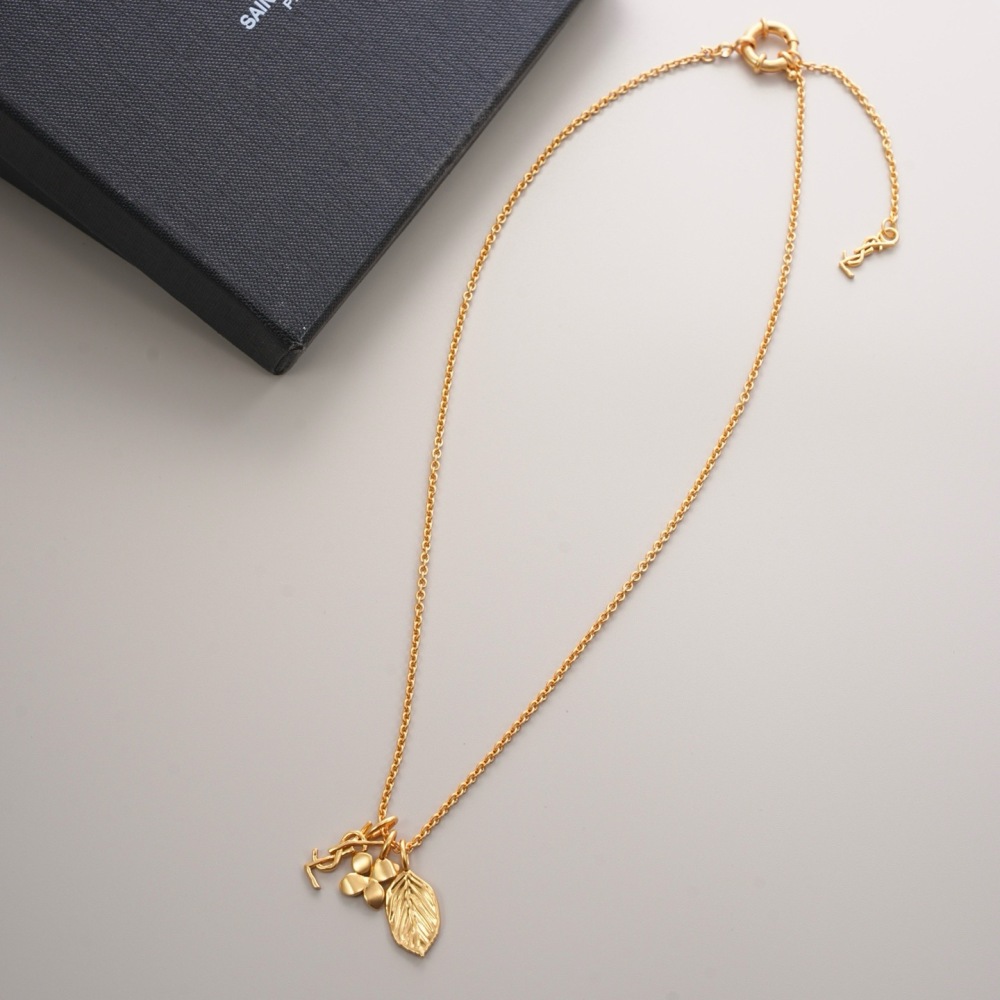 SAINT LAURENT MULTI-CHARM GOLD-TONE NECKLACE
