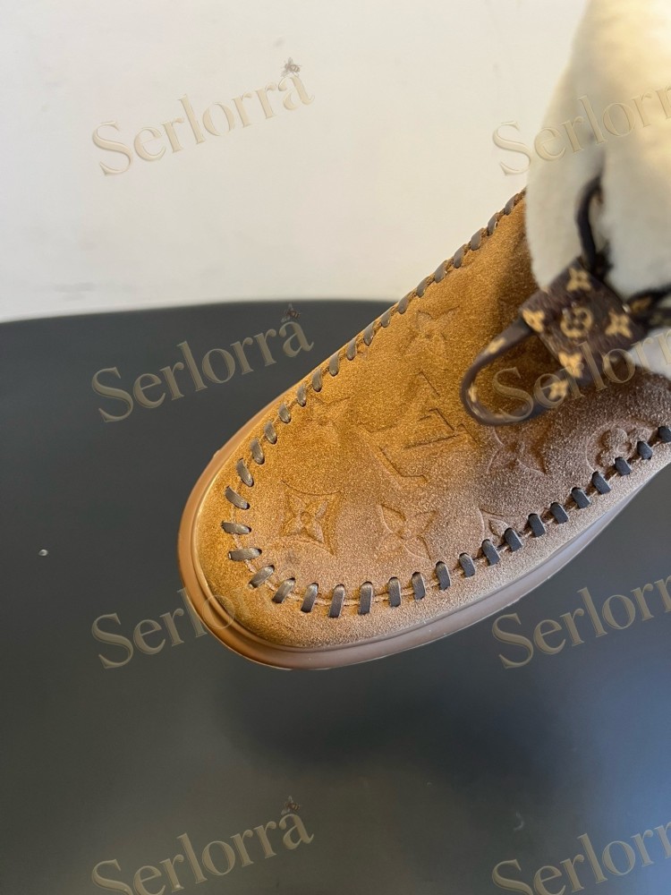 LOUIS VUITTON SHEARLING SHORT BOOTS