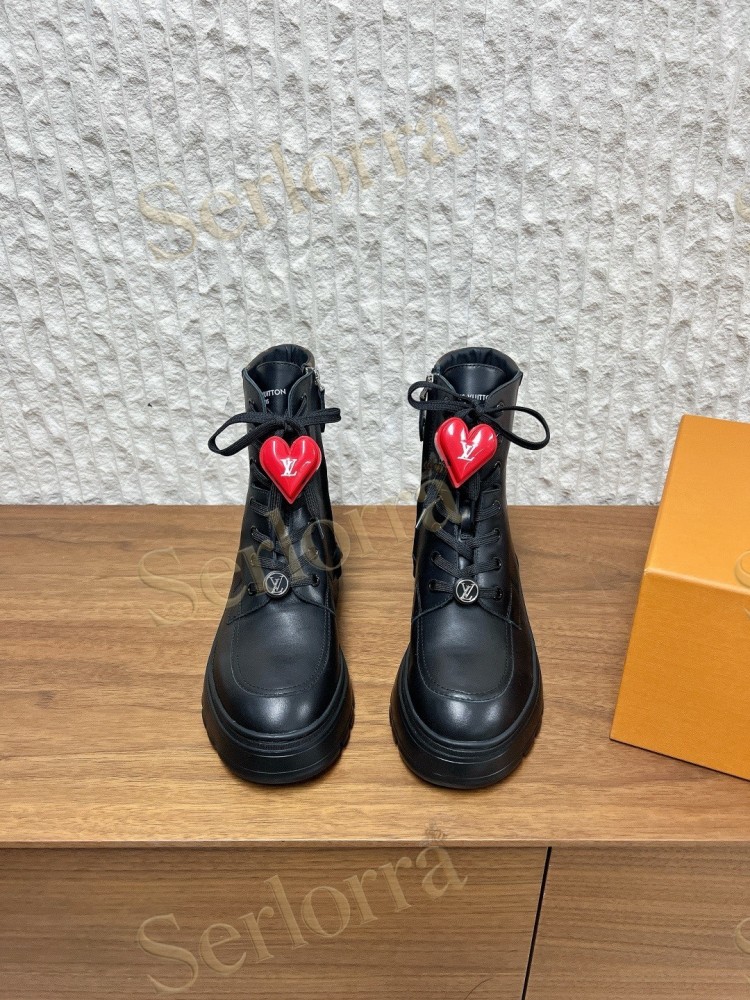 LOUIS VUITTON LACE‑UP COMBAT BOOTS