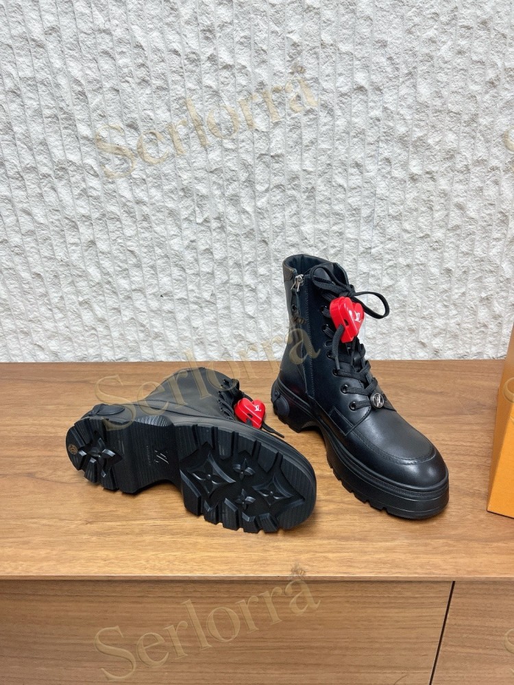 LOUIS VUITTON LACE‑UP COMBAT BOOTS
