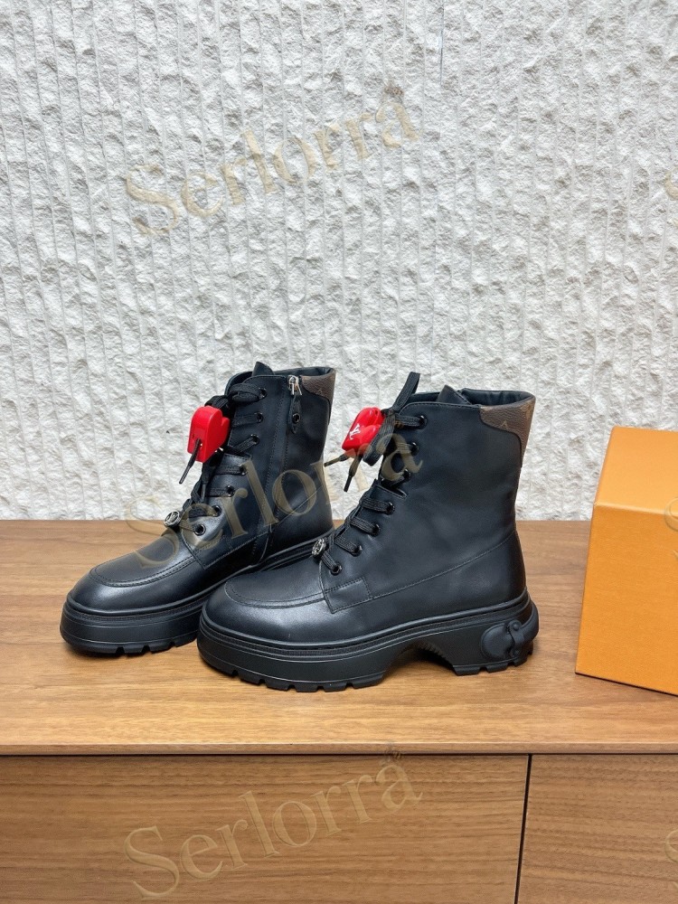 LOUIS VUITTON LACE‑UP COMBAT BOOTS