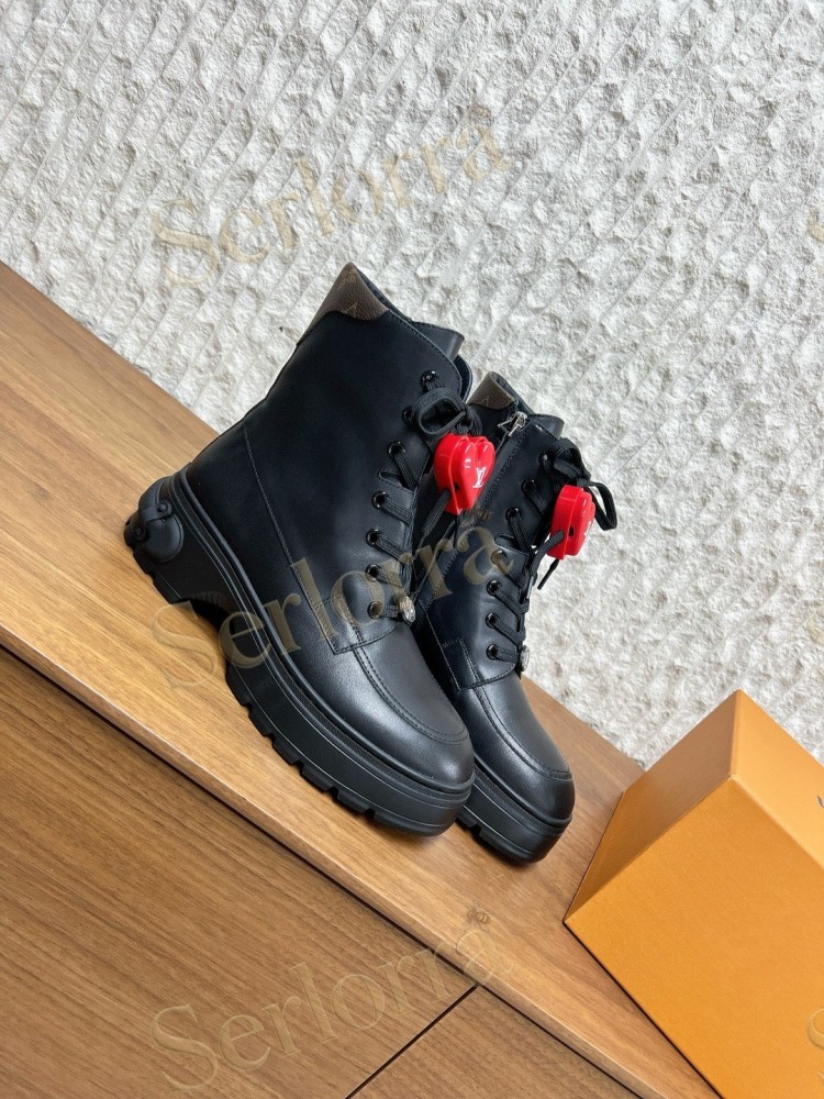 LOUIS VUITTON LACE‑UP COMBAT BOOTS