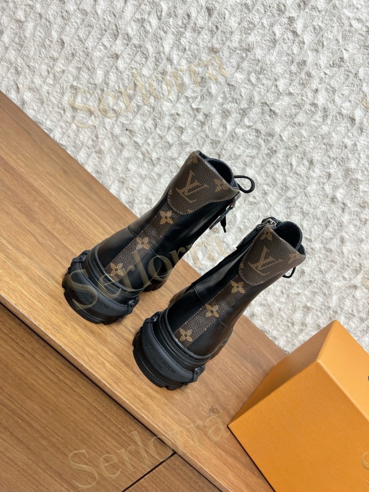 LOUIS VUITTON LACE‑UP COMBAT BOOTS