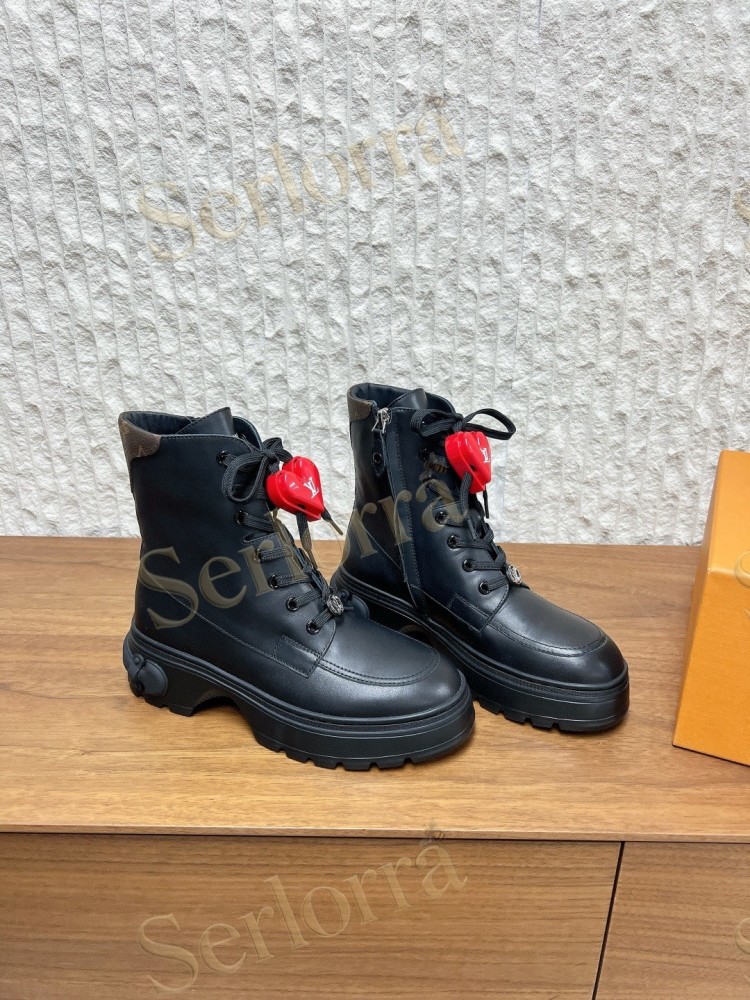 LOUIS VUITTON LACE‑UP COMBAT BOOTS