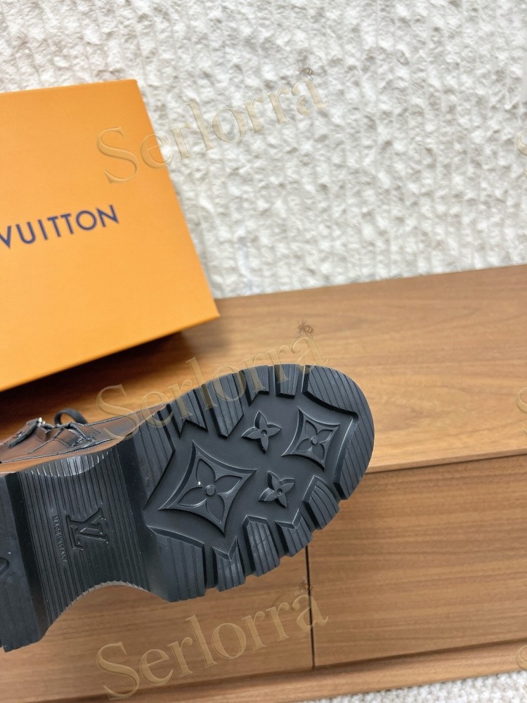 LOUIS VUITTON LACE‑UP COMBAT BOOTS