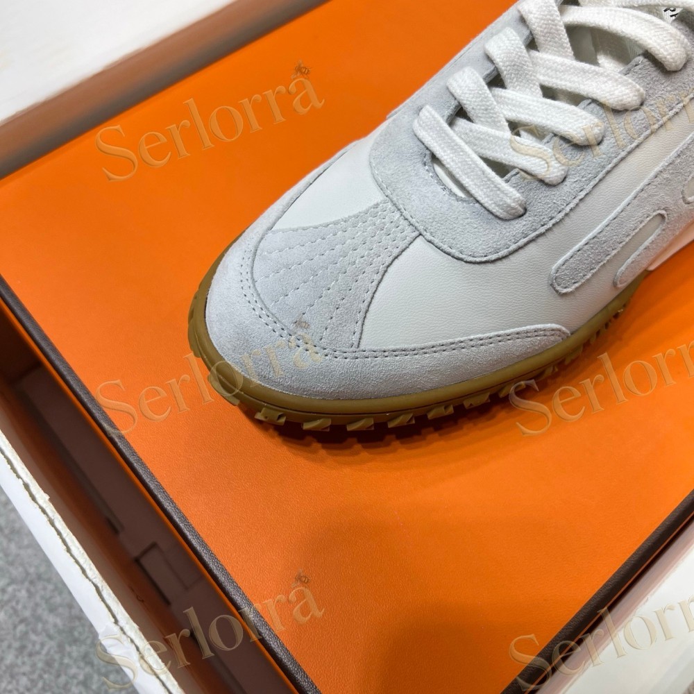 HERMÈS LIGHT SUEDE AND LEATHER JET LOW‑TOP SNEAKERS