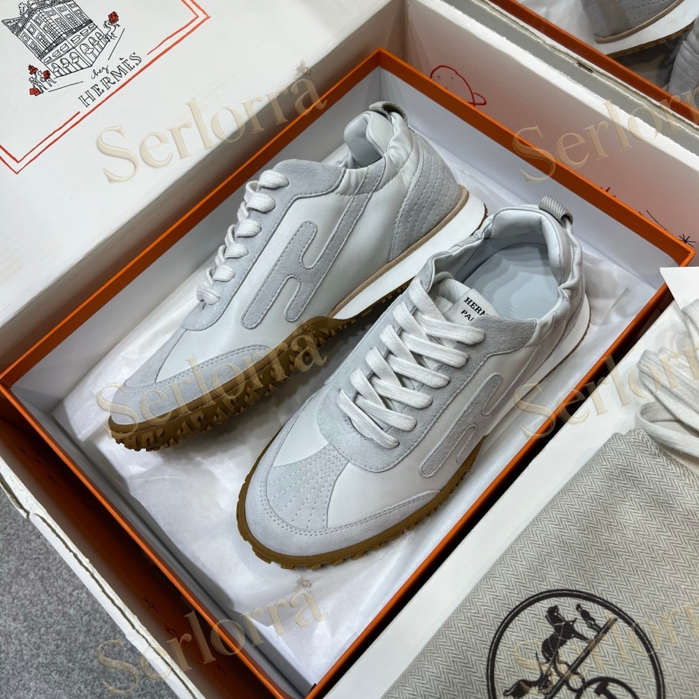 HERMÈS LIGHT SUEDE AND LEATHER JET LOW‑TOP SNEAKERS