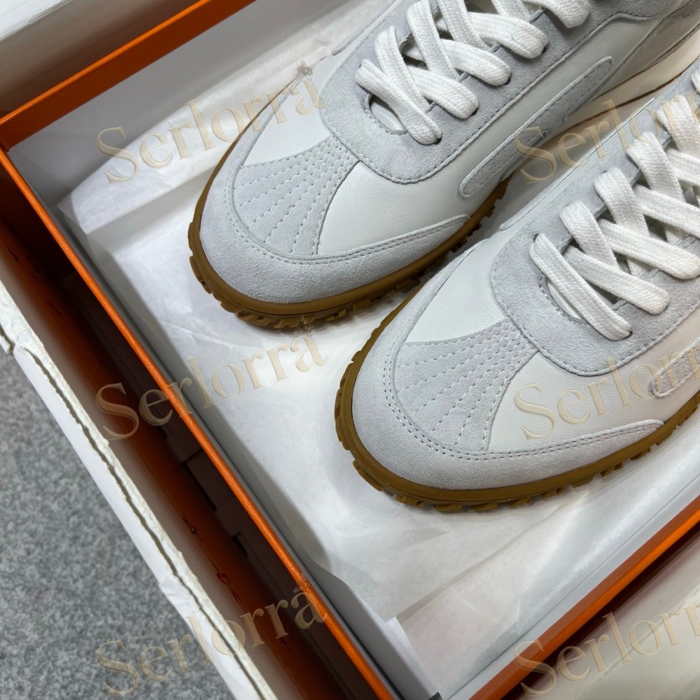 HERMÈS LIGHT SUEDE AND LEATHER JET LOW‑TOP SNEAKERS