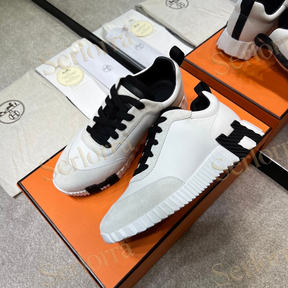 HERMÈS LIGHT SUEDE AND LEATHER JET LOW‑TOP SNEAKERS