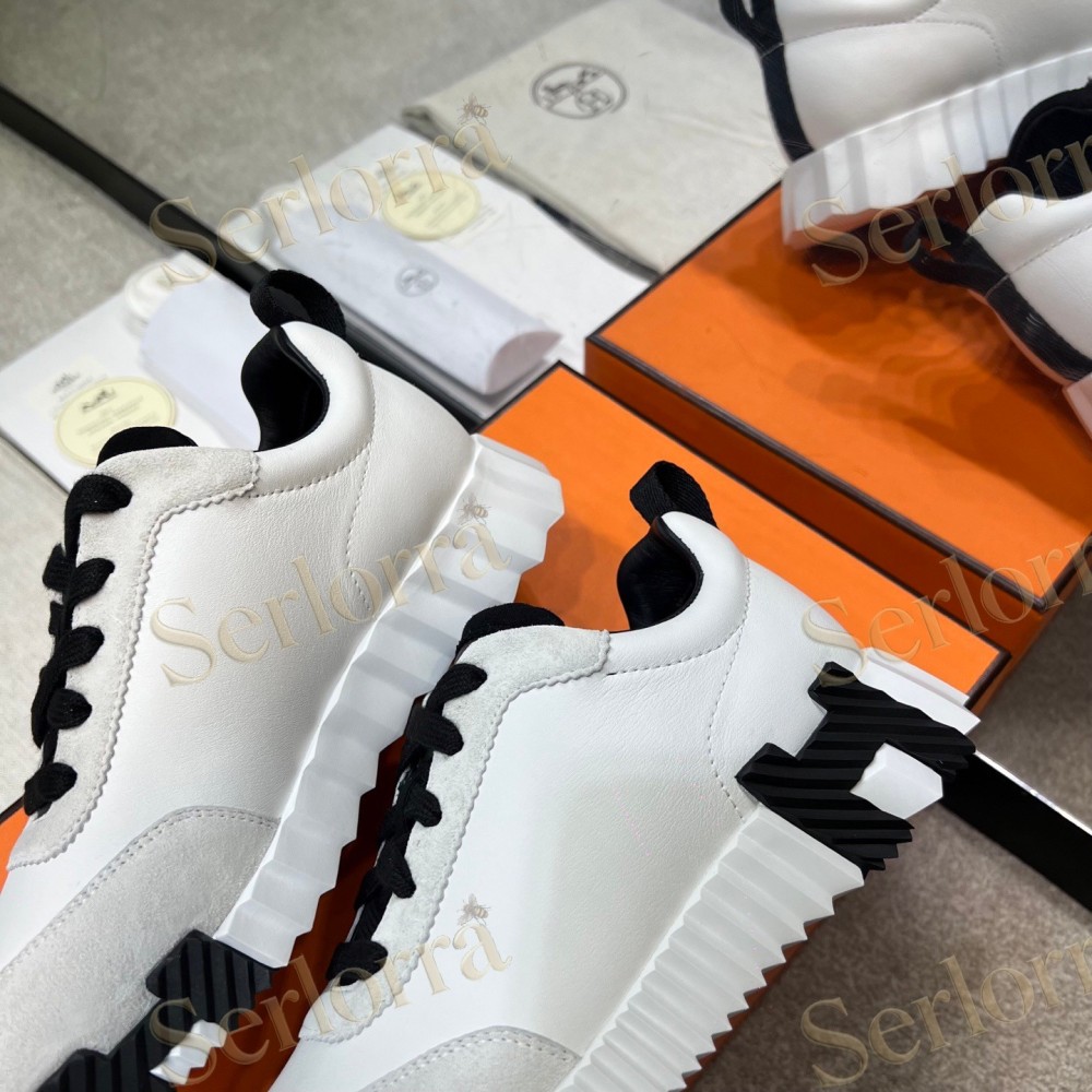 HERMÈS LIGHT SUEDE AND LEATHER JET LOW‑TOP SNEAKERS