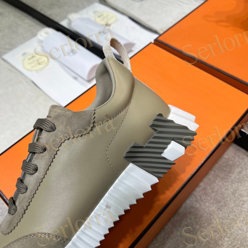 HERMÈS LIGHT SUEDE AND LEATHER JET LOW‑TOP SNEAKERS