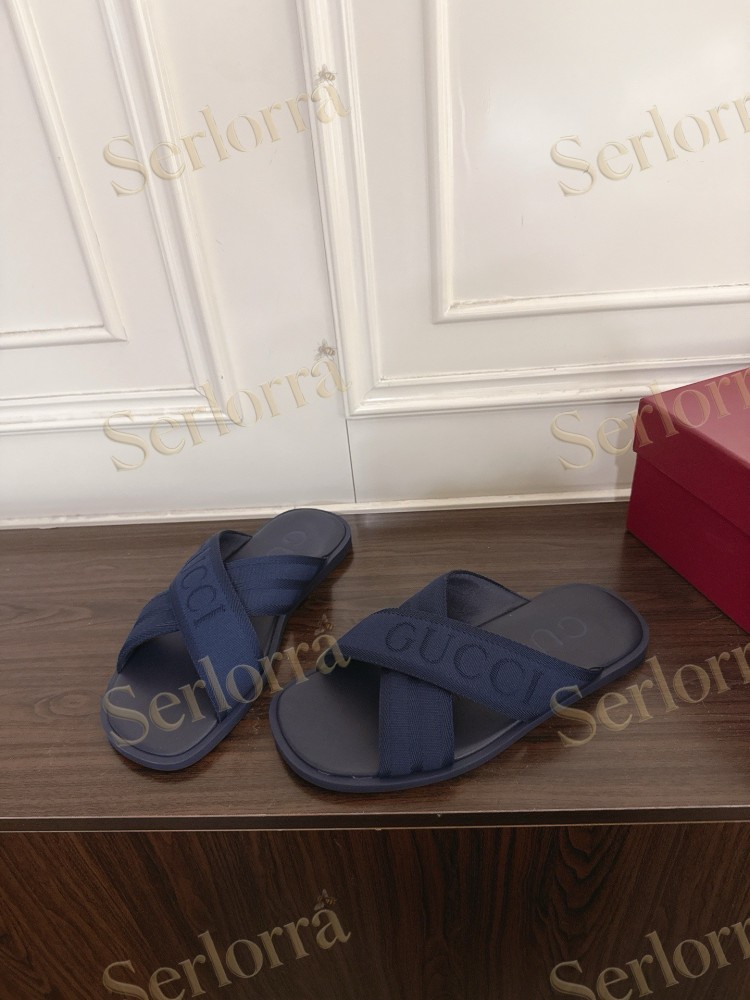GUCCI EMBROIDERED LOGO CROSS STRAP SLIDE SANDALS