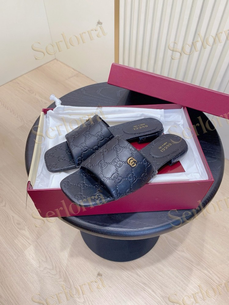 GUCCI ALL-OVER GG EMBOSSED LEATHER DOUBLE G SLIDE SANDALS