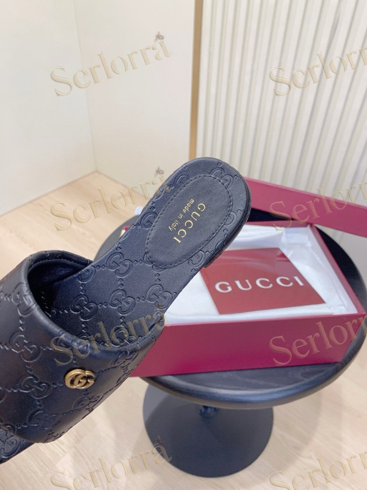 GUCCI ALL-OVER GG EMBOSSED LEATHER DOUBLE G SLIDE SANDALS