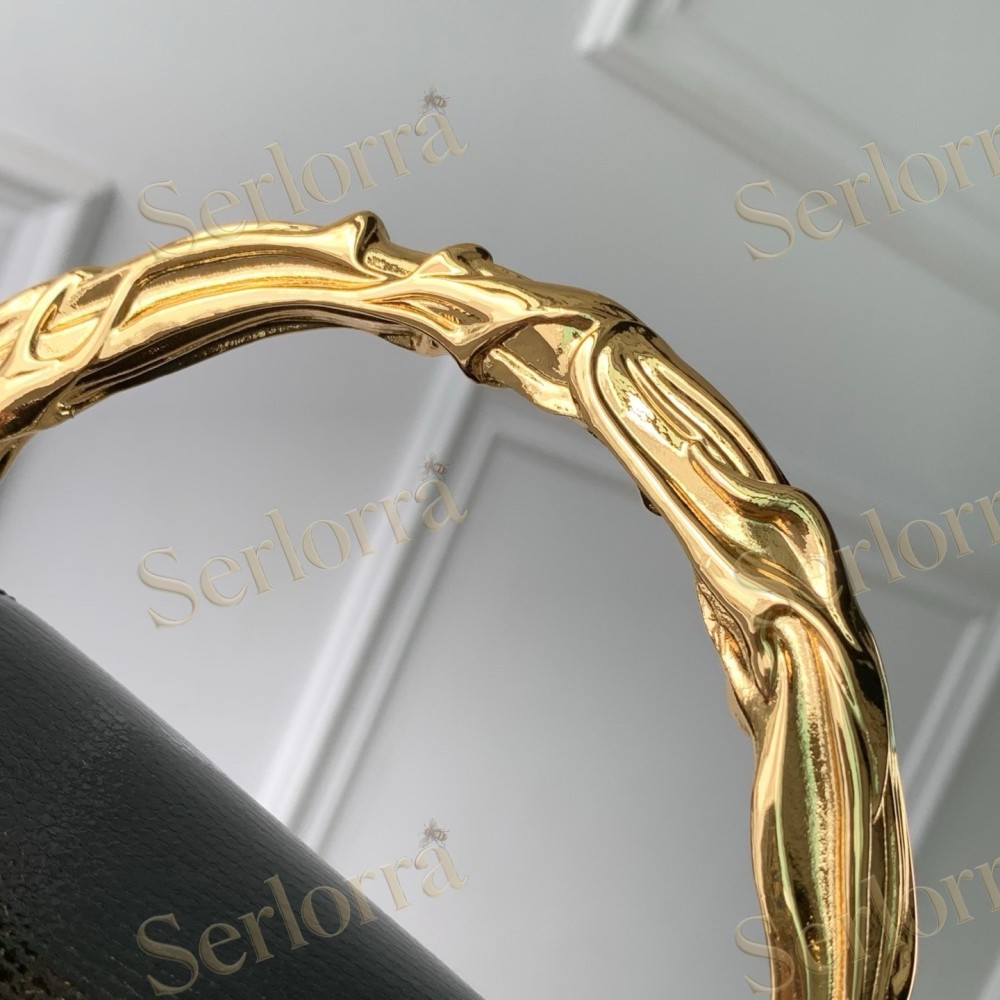 LOUIS VUITTON CAPUCINES MINI CARVED HANDLE TAURILLON LEATHER HANDBAG