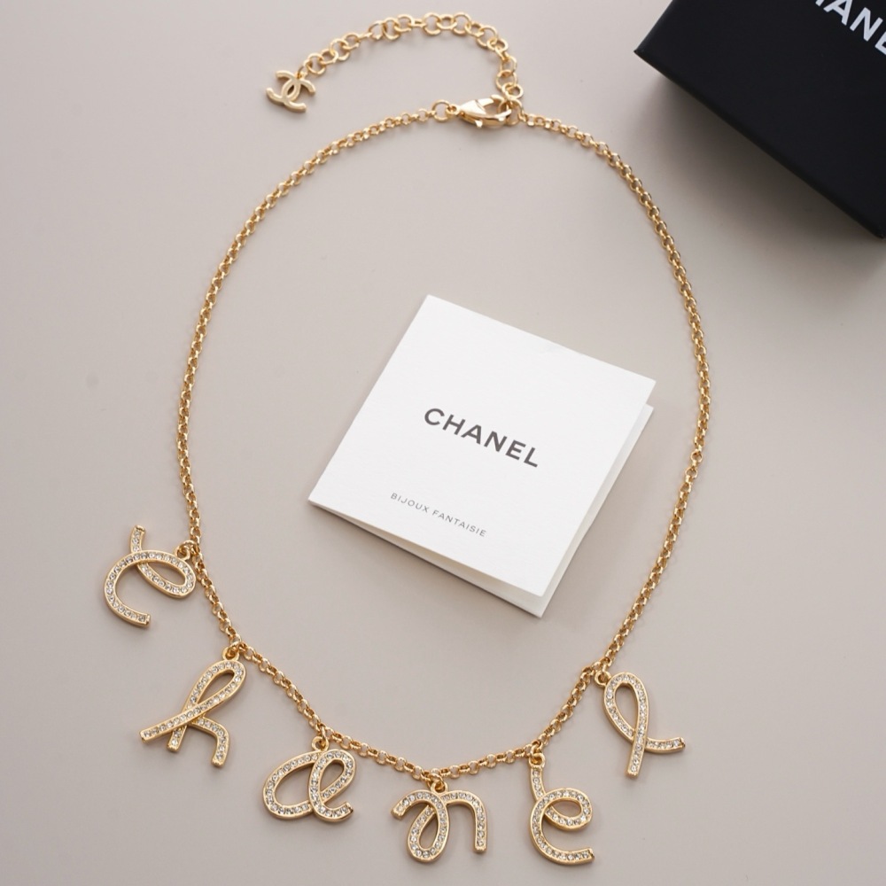 CHANEL SCRIPT LETTER CHARM CHAN‑EL NECKLACE