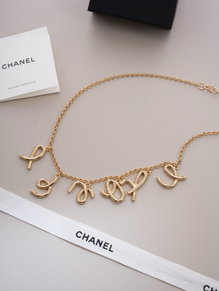 CHANEL SCRIPT LETTER CHARM CHAN‑EL NECKLACE