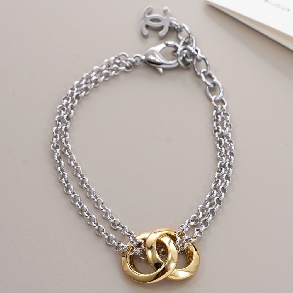 CHANEL TWO‑TONE INTERLOCKING DOUBLE‑RING DOUBLE CHAIN BRACELET